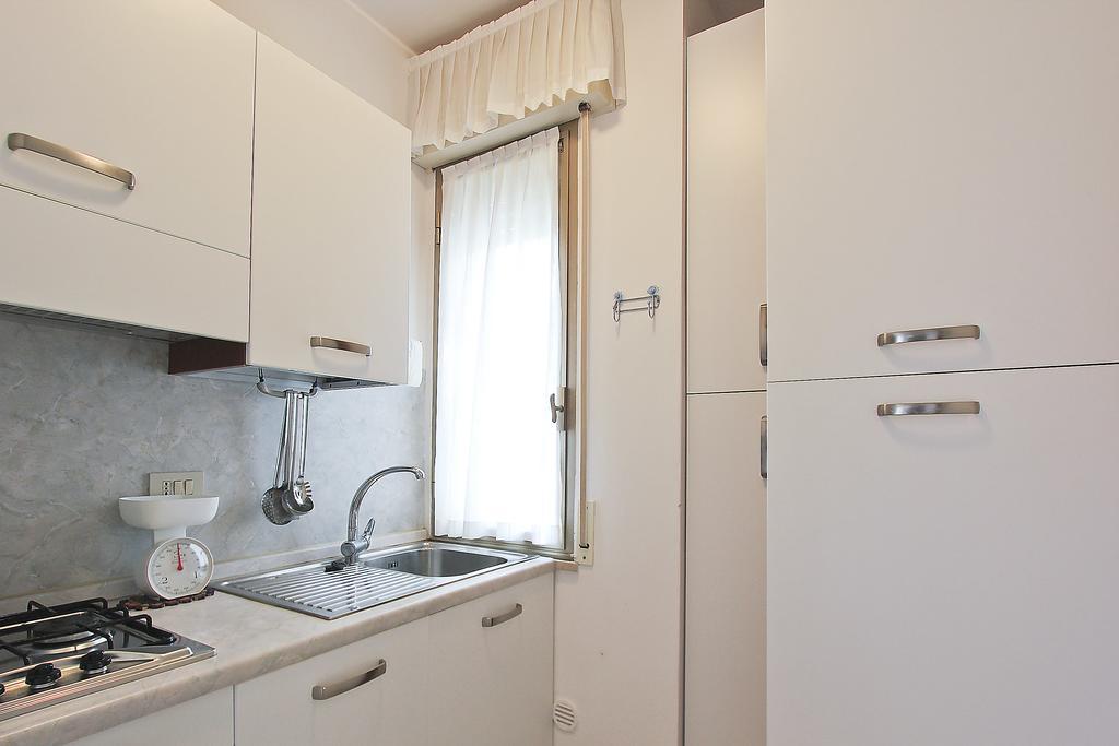 Residenza Ibsen Appartement Lignano Sabbiadoro Kamer foto