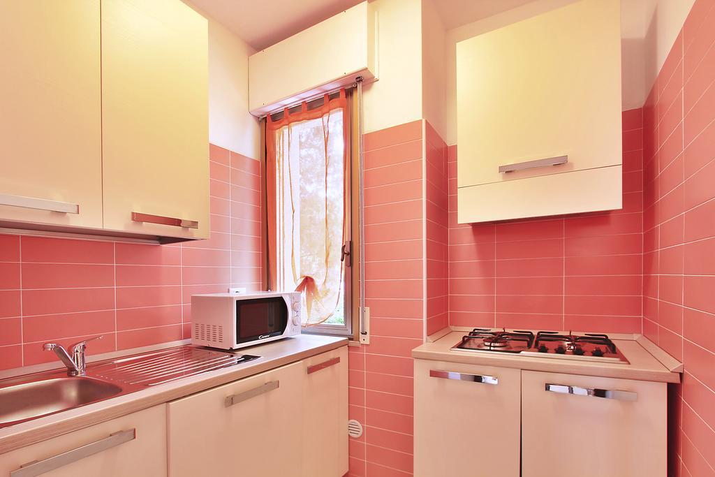 Residenza Ibsen Appartement Lignano Sabbiadoro Kamer foto